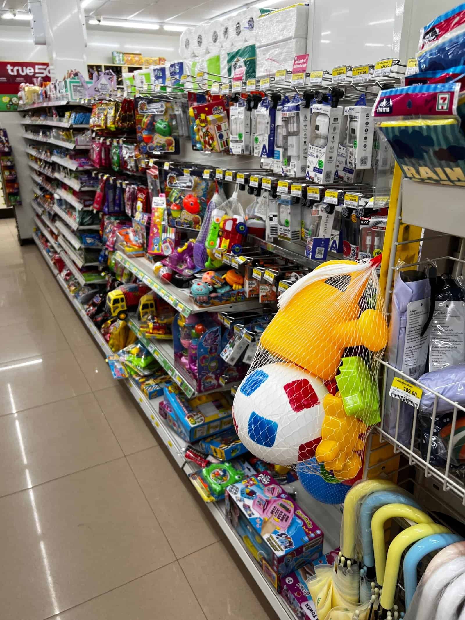 Phone chargers and beach pool toys at 7-Eleven Thailand