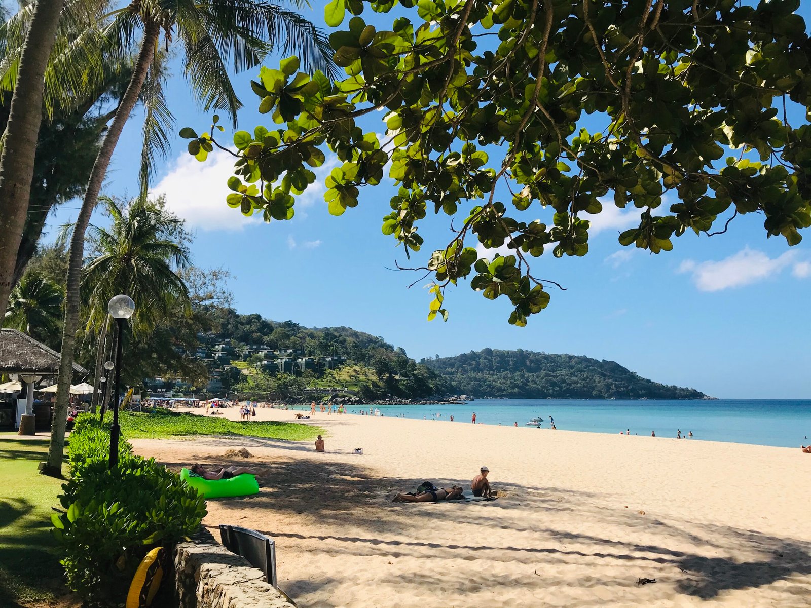 Kata Noi Beach in Phuket, Thailand, featuring soft golden sand, crystal-clear water and a peaceful tropical setting
