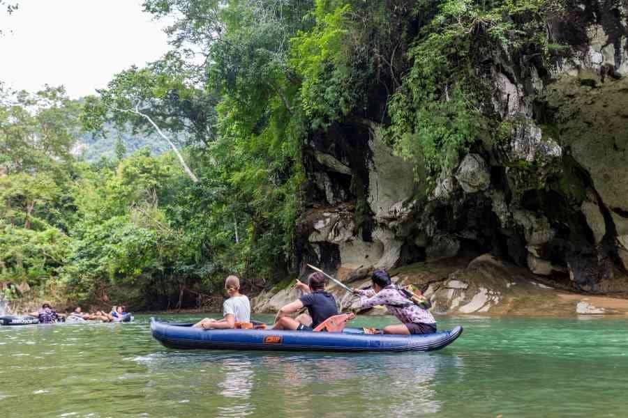 Guest in a canoe looking for wildlife on the Khao Sok Day Tour