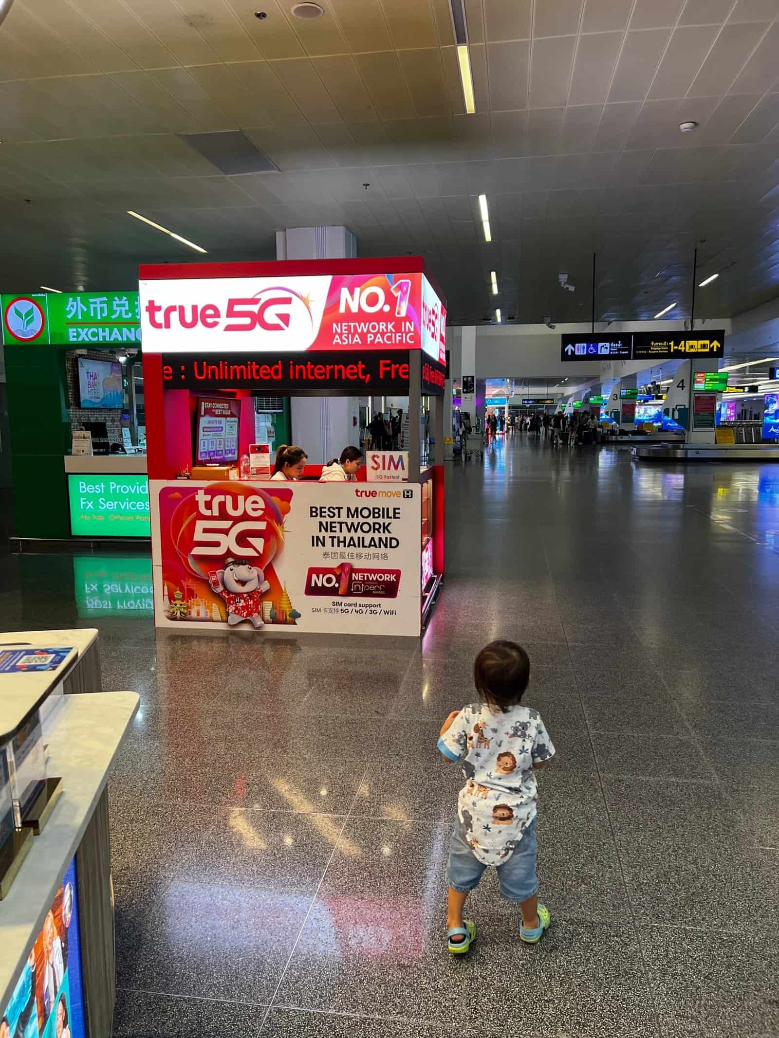 True Move SIM card stand Phuket Airport baggage collection arrival HKT