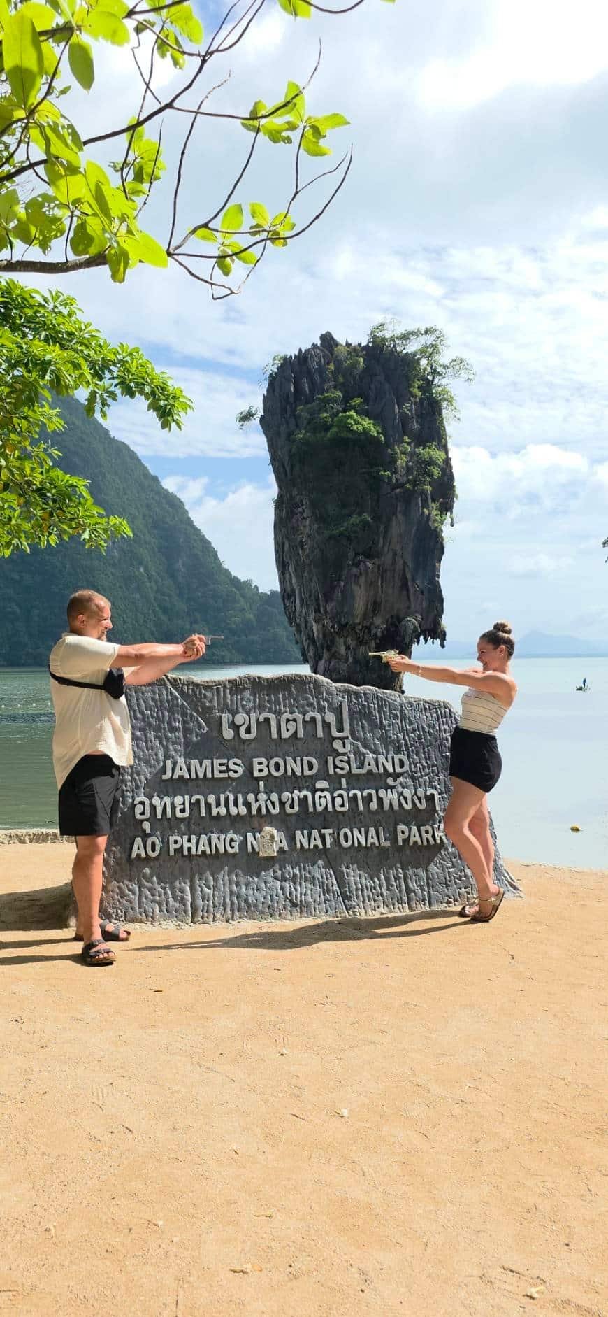Guests posing James Bond style at James Bond Island