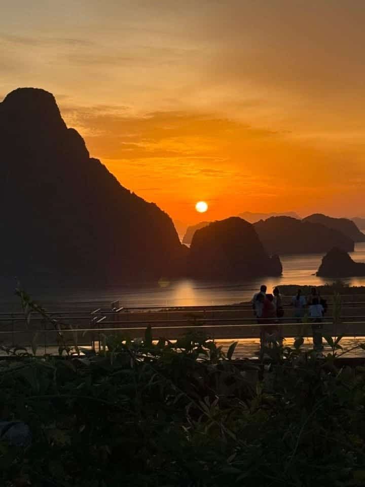 Sun rising behind Phang Nga Bay karsts from Samet Nangshe Beyond Skywalk